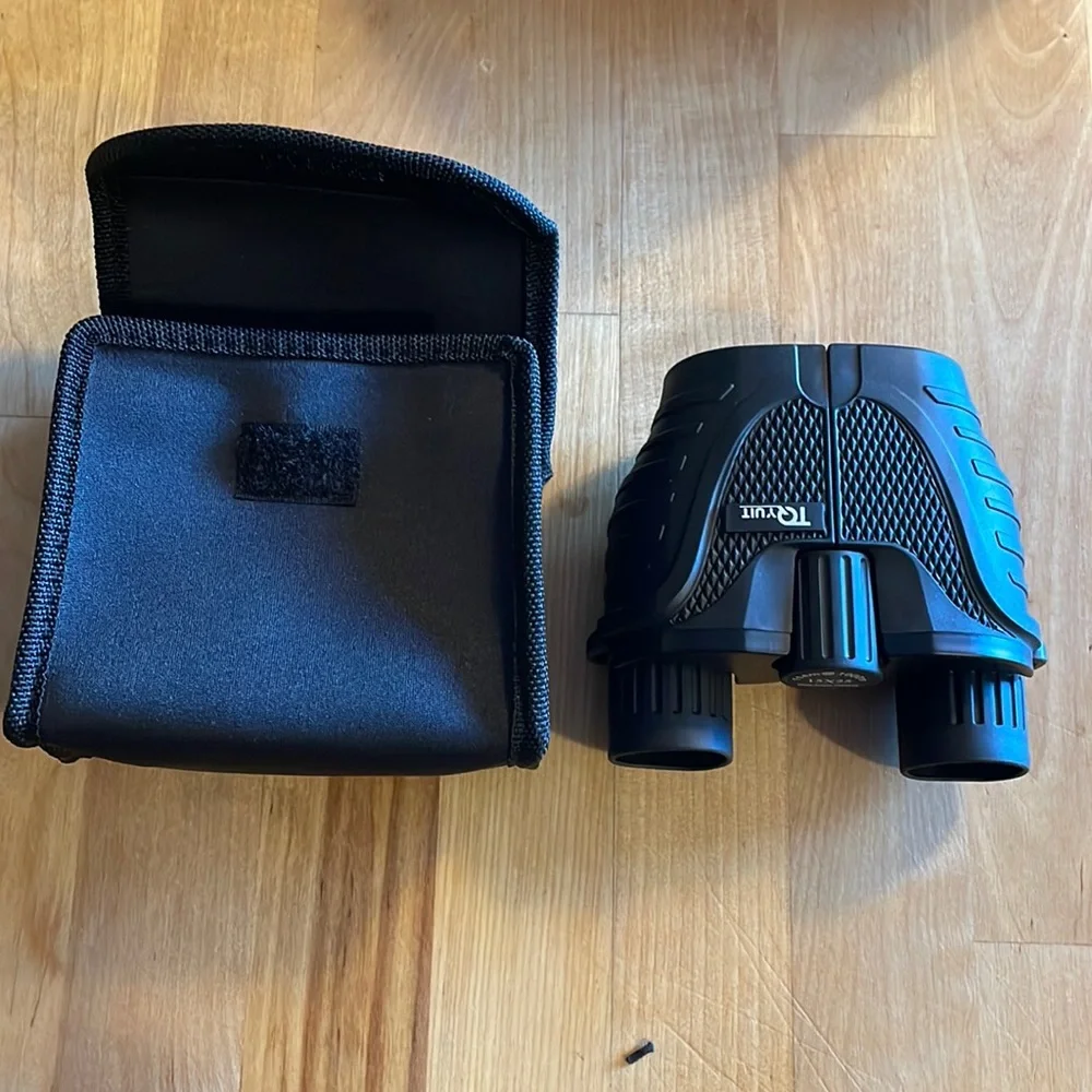 15x25 Binoculars. New. Great for hunting or sports.